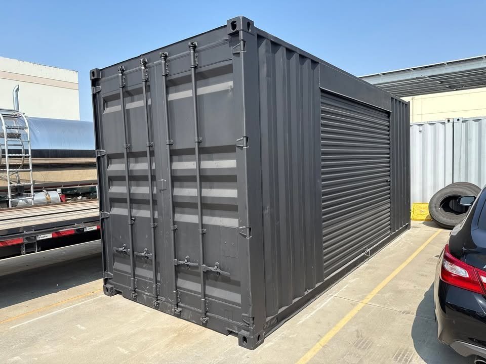 20ft Shipping Container – Matte Black w/ 12’ Side Roll-Up Door for sale – Available